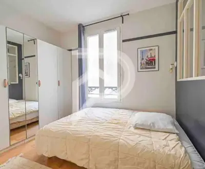 Un ou plusieurs lits dans un hébergement de l'établissement Eiffel Tower Invalides Cosy Flat