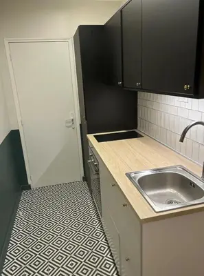 Cuisine ou kitchenette dans l'établissement Eiffel Tower Invalides Cosy Flat