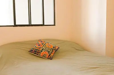 Un ou plusieurs lits dans un hébergement de l'établissement Appartement chic et moderne au cœur de Paris