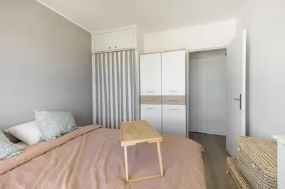 Un ou plusieurs lits dans un hébergement de l'établissement Appartement Élégant à Montmartre