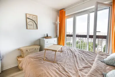 Un ou plusieurs lits dans un hébergement de l'établissement Appartement Élégant à Montmartre
