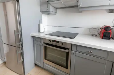 Cuisine ou kitchenette dans l'établissement Appartement Élégant à Montmartre
