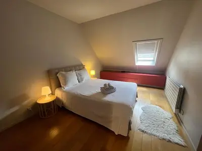 Un ou plusieurs lits dans un hébergement de l'établissement Comfort & design 2 BR near Place des Vosges