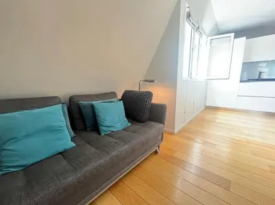 Coin salon dans l'établissement Comfort & design 2 BR near Place des Vosges