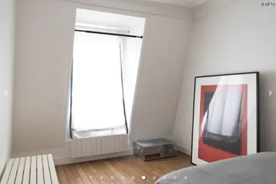 Un ou plusieurs lits dans un hébergement de l'établissement Charmant Appartement à Montmartre