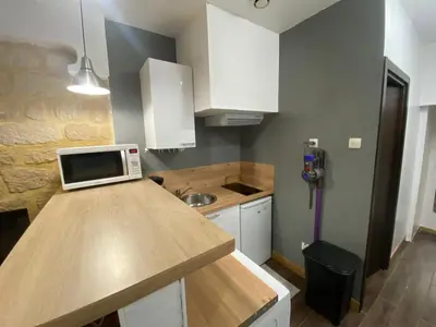 Cuisine ou kitchenette dans l'établissement Cosy T3 in Montmartre