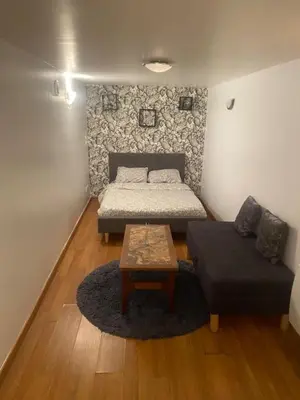 Un ou plusieurs lits dans un hébergement de l'établissement Cosy T3 in Montmartre