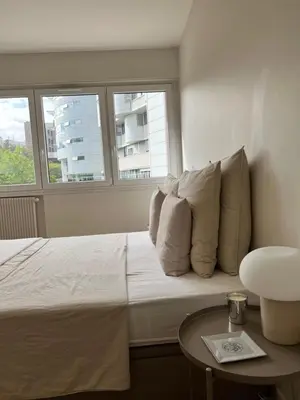 Un ou plusieurs lits dans un hébergement de l'établissement Luxury apartment 16'