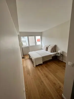 Un ou plusieurs lits dans un hébergement de l'établissement Luxury apartment 16'