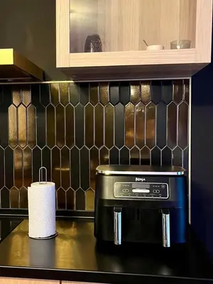 Cuisine ou kitchenette dans l'établissement Appartement au Cœur des Ternes - Arc de Triomphe