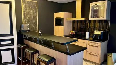 Cuisine ou kitchenette dans l'établissement Appartement au Cœur des Ternes - Arc de Triomphe