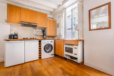 Cuisine ou kitchenette dans l'établissement Havre de paix au cœur de Paris avec Notre-Dame