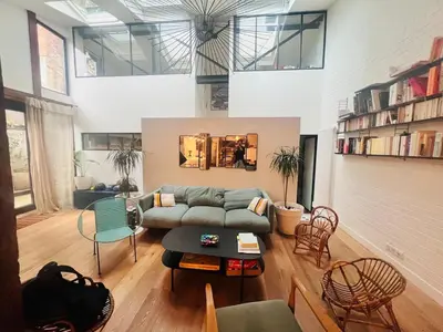 Coin salon dans l'établissement Maison de charme pour 6 | 15 Mins de Paris Centre