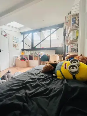 Un ou plusieurs lits dans un hébergement de l'établissement Maison de charme pour 6 | 15 Mins de Paris Centre
