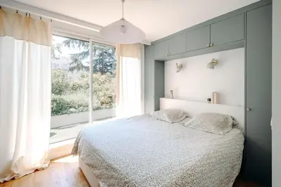 Un ou plusieurs lits dans un hébergement de l'établissement Jardin | Duplex familial de luxe