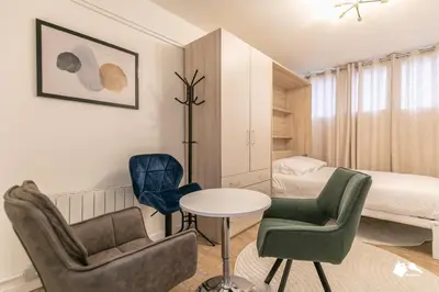 Coin salon dans l'établissement MBA - Beslay - Splendide Appartement Paris Centre