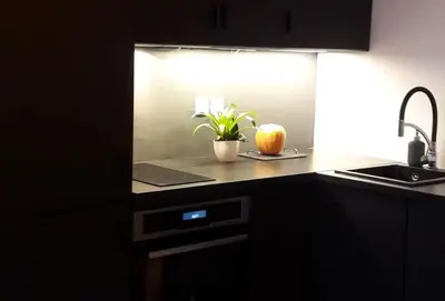 Cuisine ou kitchenette dans l'établissement Bel Appartement Parisien, TYPIQUE DU MARAIS