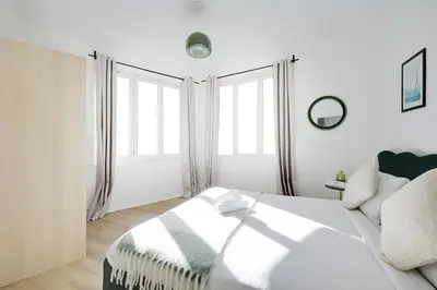 Un ou plusieurs lits dans un hébergement de l'établissement Magnifique appartement 8pers L014