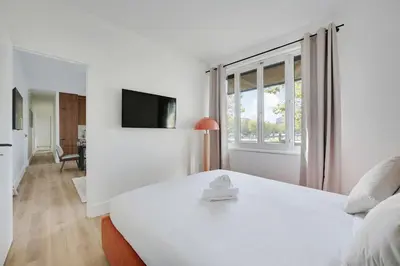 Un ou plusieurs lits dans un hébergement de l'établissement Magnifique appartement 8pers L014