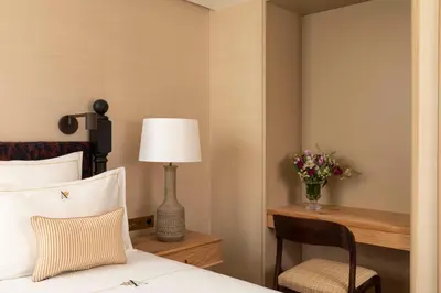 Un ou plusieurs lits dans un hébergement de l'établissement Hôtel Aubépine