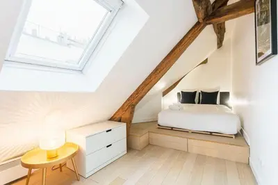 Un ou plusieurs lits dans un hébergement de l'établissement Central Appartement - Sentier