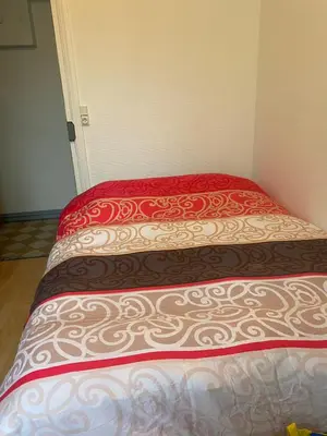 Un ou plusieurs lits dans un hébergement de l'établissement Cosy studio in Parisian area 16th