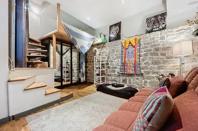 Coin salon dans l'établissement Charming Studio Near Le Louvre Rivoli