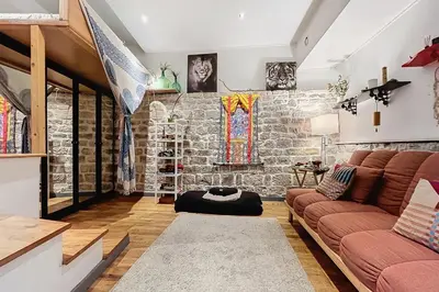 Coin salon dans l'établissement Charming Studio Near Le Louvre Rivoli