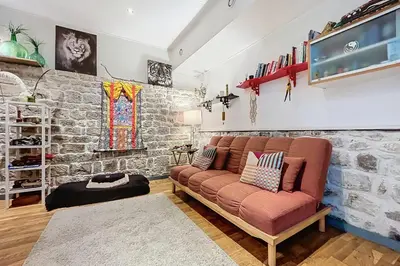 Coin salon dans l'établissement Charming Studio Near Le Louvre Rivoli