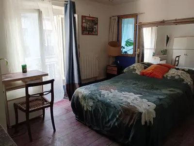 Un ou plusieurs lits dans un hébergement de l'établissement Paris Centre appartement 2 chambre