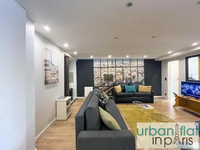 Coin salon dans l'établissement Urban Flat 120 - Charming 3 bedroom Flat in Le Marais