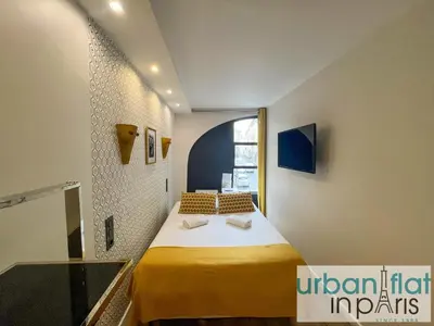Un ou plusieurs lits dans un hébergement de l'établissement Urban Flat 120 - Charming 3 bedroom Flat in Le Marais