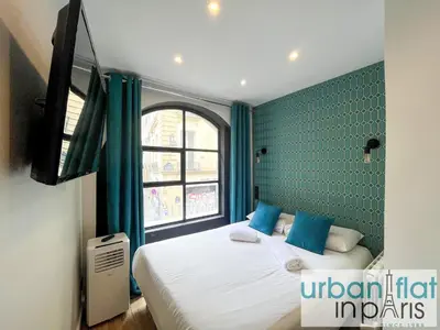 Un ou plusieurs lits dans un hébergement de l'établissement Urban Flat 120 - Charming 3 bedroom Flat in Le Marais