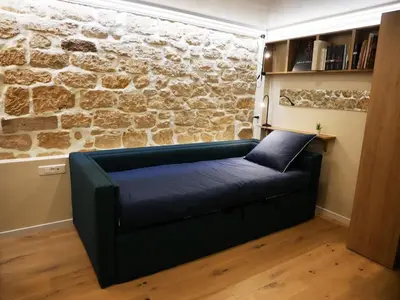 Coin salon dans l'établissement Maison Moisan - studio 27m2 à Paris 6e
