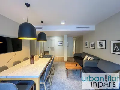 Coin salon dans l'établissement Urban Flat 118 - Luxury 4 BDR Flat near Saint Germain