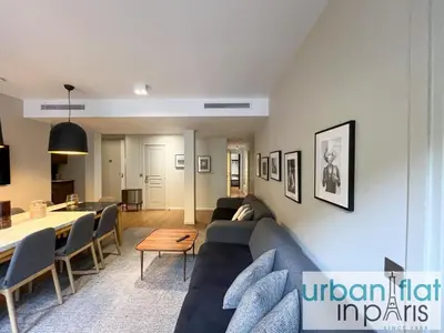 Coin salon dans l'établissement Urban Flat 118 - Luxury 4 BDR Flat near Saint Germain