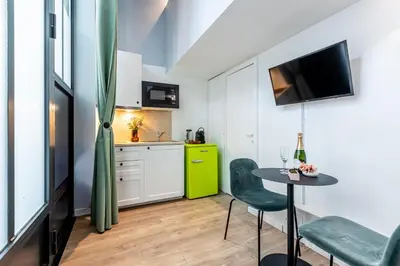 Cuisine ou kitchenette dans l'établissement Sweett - Studio Brune