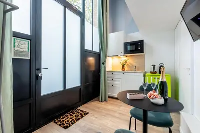 Cuisine ou kitchenette dans l'établissement Sweett - Studio Brune