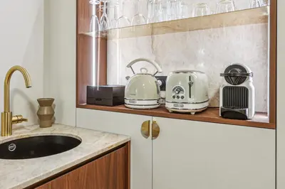 Cuisine ou kitchenette dans l'établissement Modern apartment - 2P Madeleine - Grand Boulevard