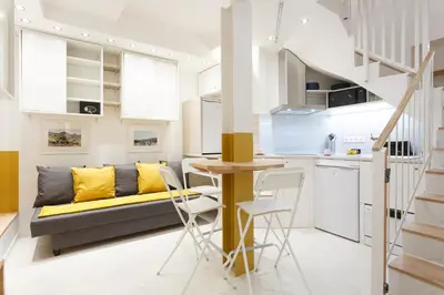 Cuisine ou kitchenette dans l'établissement Appartement Petits Champs