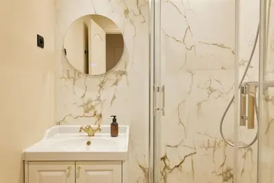 Salle de bains dans l'établissement Versailles Suite - Duke Housing