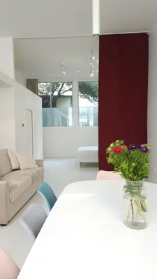 Un ou plusieurs lits dans un hébergement de l'établissement Loft Moderne et Lumineux