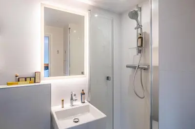Salle de bains dans l'établissement Hotel du College de France