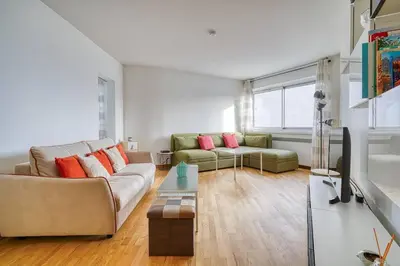 Coin salon dans l'établissement Cozy apartment 5 people Tour Eiffel - Champ de Mars