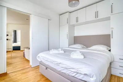 Un ou plusieurs lits dans un hébergement de l'établissement Cozy apartment 5 people Tour Eiffel - Champ de Mars