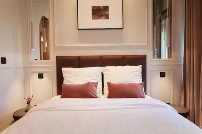 Un ou plusieurs lits dans un hébergement de l'établissement Rosso Levanto Room - Duke Housing