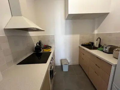 Cuisine ou kitchenette dans l'établissement Appartement en plein coeur du Marais