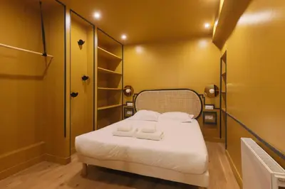 Un ou plusieurs lits dans un hébergement de l'établissement Chic apartment - 1BR-4P - Center of Paris