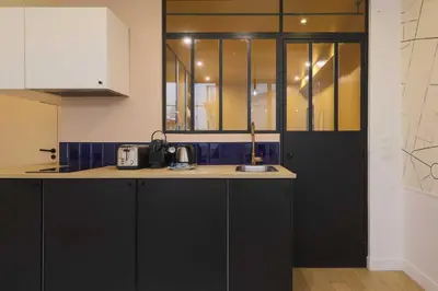 Cuisine ou kitchenette dans l'établissement Chic apartment - 1BR-4P - Center of Paris