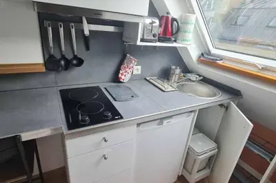 Cuisine ou kitchenette dans l'établissement Cocon des Champs-Élysées